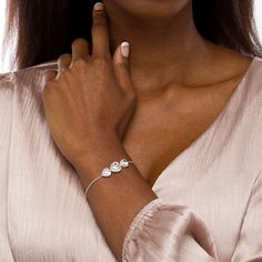 Let your romantic side shine through this darling heart-shaped white lab-created sapphire frames three-stone bolo bracelet in silver. Crafted in sterling silver This look showcases a trio of sideways heart-shaped shimmering white lab-created sapphires - the largest a 9.0mm center stone. Petite lab-created sapphires surround each stone to complete the design. This wheat chain bracelet adjusts up to 9.0 inches in length and secures with a bolo clasp and ball ends. Bolo Bracelet, Bracelet In Silver, Alternative Metal, White Lab, Sapphire Stone, Stone Heart, Precious Jewelry, Three Stone, White Metal