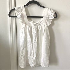 Nwt White Dress Top With Ruffled Straps. A Little Wrinkly From Being In A Drawer, But Otherwise No Flaws/Stains Noticed. Please Let Me Know If You Have Any Questions! Summer Tops With Ruffle Hem, Summer Mini Top With Ruffle Hem, White Ruffle Sleeve Mini Dress For Daywear, Cotton Mini Dress With Ruffle Sleeves For Day Out, White Mini Dress With Ruffle Sleeves For Daywear, Summer Cotton Mini Dress With Ruffle Sleeves, Cotton Mini Dress With Ruffles For Daytime, Cotton Mini Dress With Ruffle Sleeves For Summer, White Casual Mini Dress With Ruffle Sleeves