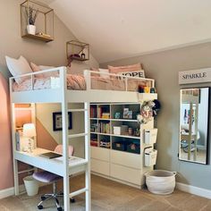 a loft bed is in the corner of a room with a desk and bookshelf