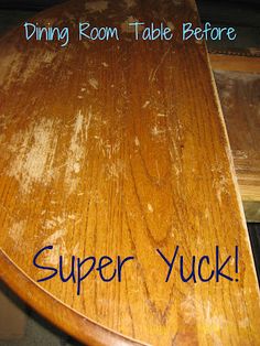 a wooden table with the words dining room table before super yuck written on it