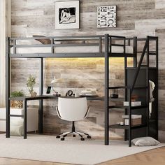 a loft bed with desk underneath it in a room that has wood paneling on the walls