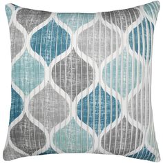 a blue and grey pillow with wavy lines