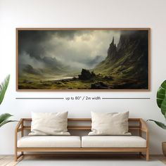 a large painting hanging on the wall above a couch in a room with white walls