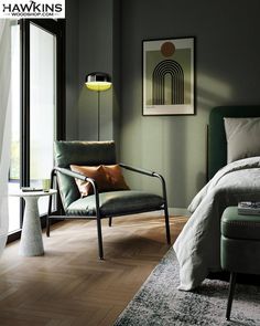 a bedroom scene with focus on the bed, chair and window sill in the foreground