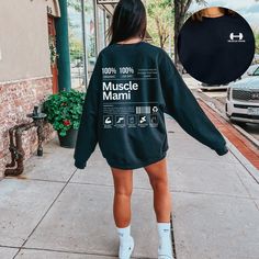 Introducing the Muscle Mami Crewneck, the ultimate statement piece for all the gym baddies out there! Designed with powerlifting and weightlifting in mind, this gym tee is perfect for those who want to express their strength and confidence. .: Made with a medium-heavy fabric blend of 50% cotton and 50% polyester (8.0 oz/yd² (271.25 g/m this sweatshirt feels cozy and is the perfect choice for those colder months. .: The classic fit along with the crew neckline deliver a comfy wearing experience with a clean-cut style. Meanwhile, the double-needle stitching at the shoulder, armhole, neck, waistband, and cuff seams add top-tier durability.  .: Say goodbye to itchiness thanks to the gray, pearlized tear-away label.  .: Made using 100% ethically grown US cotton. Gildan is also a proud member of Black Activewear For Workout With Text Print, Sweat-resistant Gym Sweatshirt, Sportswear Gym Sweatshirt Sweat Resistant, Black Graphic Print Sweatshirt For Gym, Athleisure Gym Activewear With Text Print, Relaxed Fit Activewear With Text Print For Workout, Gym Activewear Crew Neck With Text Print, Sporty Text Print Activewear For Workout, Sporty Text Print Activewear For Gym