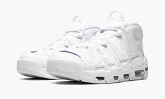 The Nike Air More Uptempo “White/Midnight Navy” is a mostly monochromatic white colorway of the old school basketball shoe that supplies a clean and bold look.  The entire upper, including the silhouette’s signature graffiti-style “AIR” branding on the sides, is designed in white leather.  A contrasting Midnight Navy Swoosh is located on the toe and a jeweled navy Swoosh is found on the heel.  Additional Swoosh detailing appears on the lateral side of the white midsole and on the outsole.  The t Old School Basketball, Nike Air More Uptempo, Nike Air More, School Basketball, Pretty Shoes Sneakers, Navy Shoes, Stadium Goods, Swag Shoes, Graffiti Styles