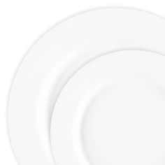 three white plates stacked on top of each other with one empty plate in the middle