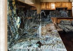 a kitchen with granite counter tops and wooden cabinets