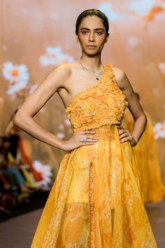 Yellow sleeveless one shoulder gown with embellished scallop bodice, loop edges detailing, sunny bloom print flare detailing. Comes with a sequin embellished shorts. - Aza Fashions Yellow Gown, Embellished Shorts, Printed Gowns, One Shoulder Gown, Ladies Gown, Gowns Online, Shorts Women, Aza Fashion, Bodice