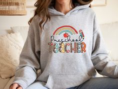 Preschool Teacher Hoodie, Preschool Hoodie, Pre-K Teacher Teacher Hoodie, Cute Teacher Hoodie, Preschool Teacher Hoodie    Hi! Welcome to✨Northstar ✨ ✨As the weather gets colder, you want clothes that keep you and your body warm. Here, Northstar  is ready to keep you warm with its unique designs..✨ ✨Product Features✨ 👉Medium-heavy fabric (8.0 oz/yd² (271.25 g/m 👉Loose fit 👉Runs true to size 👉50% cotton, 50% polyester 👉Tear-away label 👉Youth Hoodies do not have drawcord for added safety ✨Ca Fall School Fleece Sweatshirt, Casual School Fleece Hoodie, Winter School Hoodie, Casual Fleece Hoodie For School, Fall School Hoodie With Letter Print, Fall School Hoodie Sweatshirt, School Hoodie Sweatshirt With Drawstring Hood, Hooded Hoodie With Drawstring For School, Cotton Hoodie For School