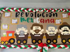 a bulletin board is decorated with paper machs and santa's helpers on it