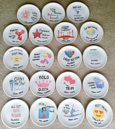 a bunch of paper plates that have different designs on them, all in different shapes and sizes