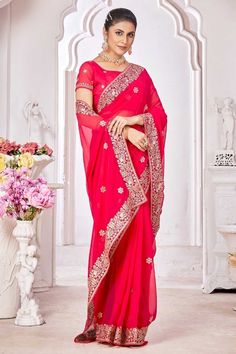 Embrace elegance with this stunning Georgette saree, designed to make every festival feel extraordinary. Crafted from lightweight Georgette fabric, the saree drapes effortlessly, offering a blend of comfort and style. The blouse, also in matching Georgette, complements the saree’s flowing texture, making it a harmonious ensemble. Delicate border work adds a refined charm, elevating the saree with a hint of traditional appeal. Ideal for festive occasions, it captures the essence of timeless beauty and modern grace.Please Note: Colors may vary slightly due to digital imaging. Accessories shown are for display purposes only. Bridal Style, Essence, Saree