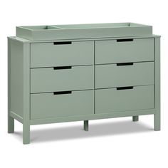 a green dresser with six drawers and two handles