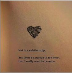 a heart drawn on top of a piece of paper with the words not in a relationship, but there's a person in my heart that i really want to be mine