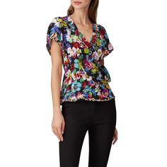 Floral printed crepe (100% Viscose). Top. Short sleeves. V-neckline. 22 from shoulder to hemline. Imported. Patterned Printed V-neck Blouse, Patterned Floral Print V-neck Top, Floral Print V-neck Tops For Work, Chic Floral Print V-neck Top, Elegant Floral Print V-neck Top, Elegant V-neck Floral Print Tops, Floral Print Rayon V-neck Top, Multicolor Floral Print V-neck Blouse, Multicolor Floral Print V-neck Top