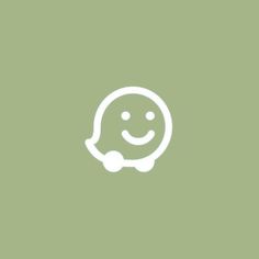 a green background with a white smiley face