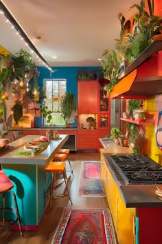 the kitchen is brightly colored and has plants on the counter top, along with colorful chairs