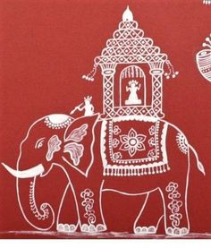 an elephant with people on it is painted in white