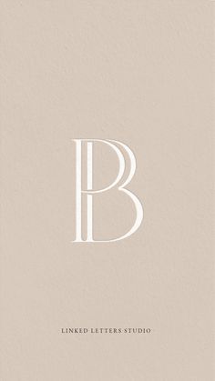 the letter b is shown in white on a beige background