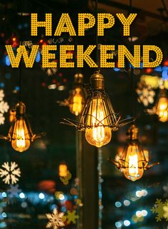 the words happy weekend are lit up in front of some lights and snowflakes