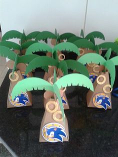 some paper palm trees are sitting on a table