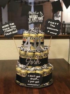 a birthday cake made to look like it has cans of beer stacked on top of each other