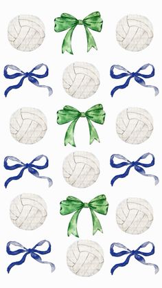 several pieces of white and blue fabric with green bows on them, all tied together