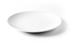 an empty white plate on a white background