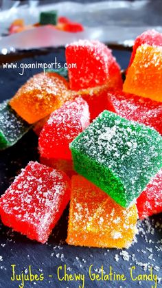 gummy jellies - chewy gelatin candy on a plate with sprinkles