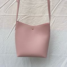 Medium Samara, Blush Colored Crossbody Purse Vegan Leather Outside, Vegan Suede Inside Adjustable Strap Button To Shut Never Used Pink Bags With Snap Closure, Samara, Blush Color, Medium Bags, Crossbody Purse, Purses Crossbody, Crossbody Bags, Vegan Leather, Adjustable Straps