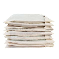 a stack of folded linens on top of each other