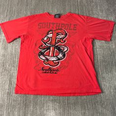 Vintage 2000s South Pole S Logo Plaid Pattern Urban Hip Hop Y2K Aesthetic Streetwear Red Graphic T Shirt Extra Large Mens Condition:  Excellent Used Condition  = No Flaws Measurements: Please see photos above for all measurements IF YOU BUY TWO OR MORE ITEMS USE THE CODE BUNDLE @ CHECK TO SAVE 20% WE SHIP WITHIN 24 HOURS AFTER PURCHASE! Please be aware that we do not offer free returns!! The Buyer is responsible for the cost of the return label.  Follow us on TikTok & Instagram @findsnostalgic a Urban Hip Hop, Aesthetic Streetwear, S Logo, Vintage 2000s, South Pole, Y2k Aesthetic, Plaid Pattern, Extra Large, Graphic T Shirt