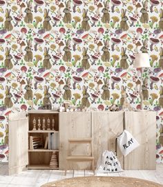 an animal themed wallpaper with rabbits and plants on the background, in a children's room