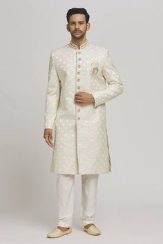 White sherwani embellished by sequins on a geometric pattern base. Comes with inner kurta and churidar. - Aza Fashions Designer Nehru Jacket With Mirror Work For Weddings, Designer Traditional Wear With Mirror Work For Wedding, Designer Kurta For Eid Reception, Formal White Kurta With Mirror Work, Elegant Sherwani With Mirror Work For Transitional Season, Designer Wedding Traditional Wear With Mirror Work, Designer Sherwani With Straight Kurta For Reception, Nehru Jacket With Mirror Work For Wedding Eid, Eid Wedding Nehru Jacket With Mirror Work