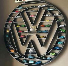 the volkswagen logo is made out of toy cars