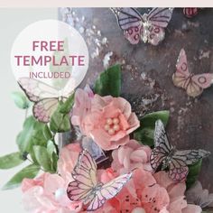 a cake with pink flowers and butterflies on it, text reads wafer paper butterfly free template included