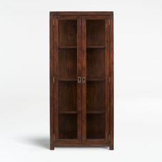 a wooden bookcase with glass doors on the front and bottom shelves, against a white background