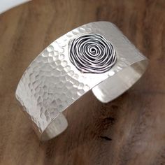 Handmade Hammered Sterling Silver shinny finish Cuff Bracelet, 1 Wide Silver Boho Statement Cuff Bangle We also have Matching style Cuff Rings:  https://www.etsy.com/listing/176672865  https://www.etsy.com/listing/185404378  https://www.etsy.com/listing/26730478   Measurements: Width: 1 / 2.5cm Modern Handmade Cuff Jewelry, Unique Sterling Silver Adjustable Cuff Bracelet, Sterling Silver Cuff Jewelry, Adjustable Hand Forged Cuff Jewelry, Adjustable Hammered Cuff Bracelet For Anniversary, Adjustable Silver Hammered Cuff Bracelet, Adjustable Wide Band Sterling Silver Cuff Bracelet, Adjustable Hammered Sterling Silver Cuff Bracelet, Adjustable Hand Forged Sterling Silver Cuff Bracelet