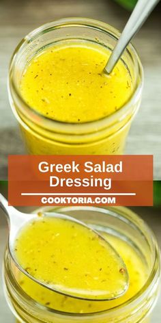 two jars filled with greek salad dressing on top of a wooden table