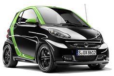 the smart car is painted black and green