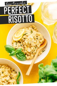 two white bowls filled with risotto next to basil leaves and lemon wedges