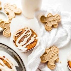 some cookies and milk are on the table