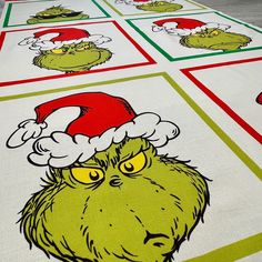 the grin face rug is on display with santa's hats