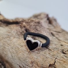 Silicone Ring Women, Black Heart Rings For Women, Minimalist Rings with Heart Pendants, Stackable Heart Bands, Black White, and Stackable Ring Introducing our new black, white, and silver heart silicone rings! This ring is the perfect addition to any outfit, made from comfortable silicone and embellished with heart pendants. Whether you're working out, hitting the beach, or simply running errands, this ring is a great everyday accessory. It's easy to wear and can be customized to fit your finger Silicone Ring Women, Ring With Heart, Heart Rings, Heart Band, Silicone Ring, Heart Pendants, Silicone Rings, Minimalist Ring, Ring Black