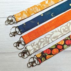 All of my lanyards are completely handmade by me!  I do not use any production partners. Fall Lanyard - Halloween Id Badge holder - Fabric  key chain -  Teacher lanyard  - Breakaway safety clasp optional A lanyard is the perfect little gift for a teacher, health professional, office worker.. or a nice treat for yourself! This lanyard measures  approx 1 inch wide with an approximate 20 inch drop.  You can ask for a shorter lanyard in the notes to seller. If you wish to have a lanyard with a half Autumn Soft, Gift For A Teacher, Health Professional, Teacher Lanyard, Office Worker, Professional Office, Id Badge Holders, Mail Letters, Badge Holder