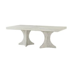 a white marble dining table with two pedestals