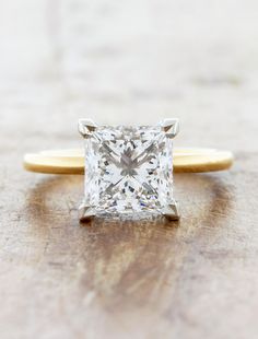 caption:2.6ct princess cut diamond Solitaire With Hidden Halo, Princess Diamond Ring, Sleek Chic, Engagement Inspo, Princess Cut Diamond, Yellow Gold Setting, Hidden Halo, Princess Diamond, Diamond Solitaire Engagement Ring