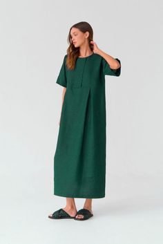 Maxi linen dress in Dark green color with short sleeves and loose fit Solid Color Linen Dress For Beach With Short Sleeves, Solid Color Short Sleeve Linen Beach Dress, Solid Linen Beach Dress With Short Sleeves, Solid Short Sleeve Linen Beach Dress, Green Relaxed Fit Maxi Dress With Short Sleeves, Solid Color Relaxed Fit Maxi Dress With Short Sleeves, Solid Color Relaxed Fit Short Sleeve Maxi Dress, Casual Oversized Maxi Linen Dress, Solid Relaxed Fit Short Sleeve Maxi Dress