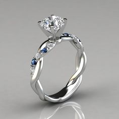 a white gold engagement ring with a twisted band